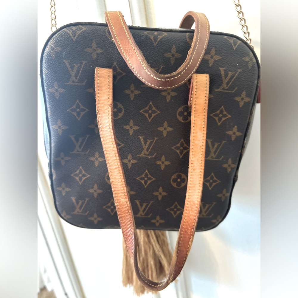 Authentic LV  cosmetic luggage piece or doubles as a purse..